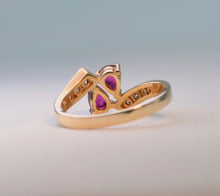 14K yellow gold ring with 2 pear-shaped Rubies and 8 side Diamonds