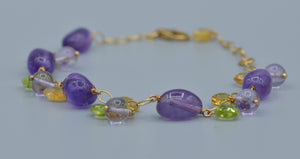 14K yellow gold 7" bracelet with Amethyst, Peridot and Citrine dangles from the gold links