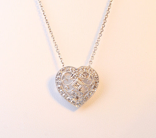 Heart-shaped diamond pendant in 18K White Gold