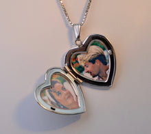 14K white gold locket with floral design on front