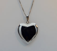 14K white gold locket with floral design on front