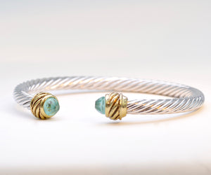 Bangle with Faceted Light Blue Stone