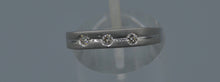 14K white gold wedding band with three Diamonds on top