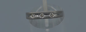 14K white gold wedding band with three Diamonds on top