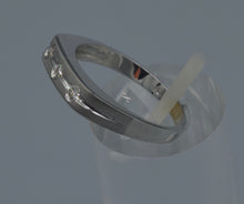 14K white gold wedding band with three Diamonds on top