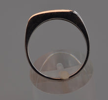 14K white gold wedding band with three Diamonds on top