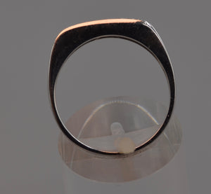 14K white gold wedding band with three Diamonds on top