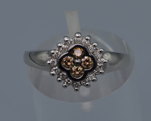 14K white gold ring with four center Brown Diamonds framed with white Diamonds