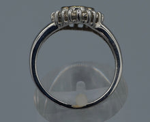 14K white gold ring with four center Brown Diamonds framed with white Diamonds