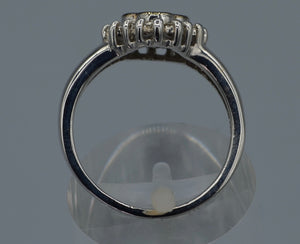 14K white gold ring with four center Brown Diamonds framed with white Diamonds
