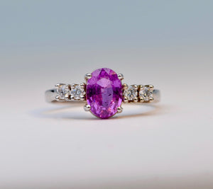 14K white gold ring with one oval Pink Sapphire and 4 Diamonds