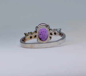 14K white gold ring with one oval Pink Sapphire and 4 Diamonds