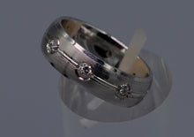 14K white gold wedding band with eight round Diamonds