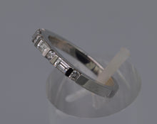 Platinum wedding band with baguette diamonds