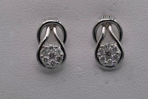 14K white gold post earrings with seven-diamond clusters