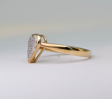 10K yellow gold ring with heart-shaped pave diamonds on top