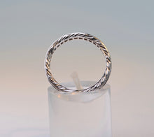 18K white gold Sapphire band with French-cut Blue Sapphires all around