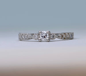 Delicate diamond ring in 14K white gold